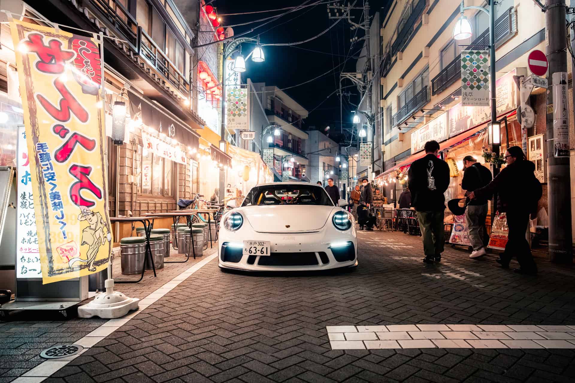 The same 911 on a Tokyo street at night, graded with an LM preset